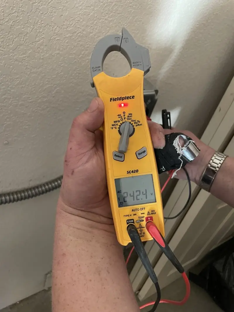 Voltage testing with clamp meter during Circuit Breaker Repair in Lee Acres